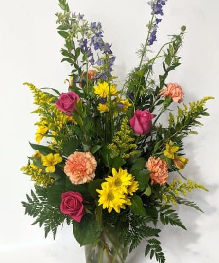 A colorful selection of fresh cuts flowers that will make her feel like a walk down a garden lane.