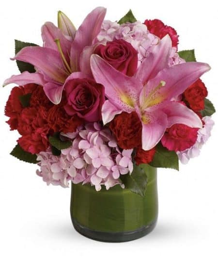 Fragrant oriental lilies, roses and hydrangea make this a fun, feminine favorite.
